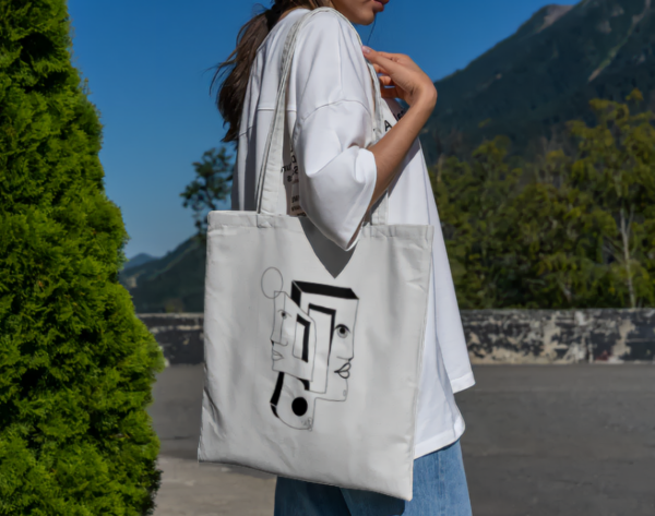 Totebag cara abstracta